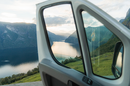 Scenic view of  fjord in Norway from camper van driver window