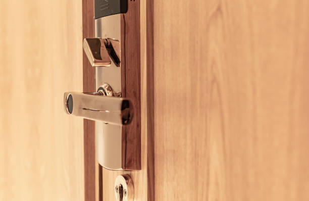 istock Hotel room door with electronic door lock 1492550342