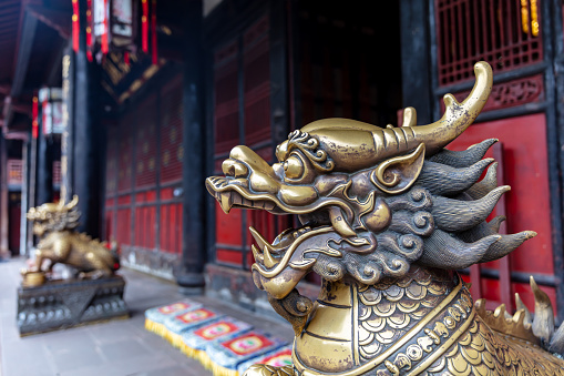 Bronze statues of gods and animals in front of Chinese temples