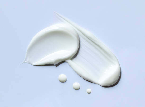 istock cosmetic smears cream texture on pastel background 1492553685