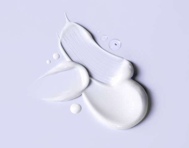 istock cosmetic smears cream texture on pastel purple background 1492553789