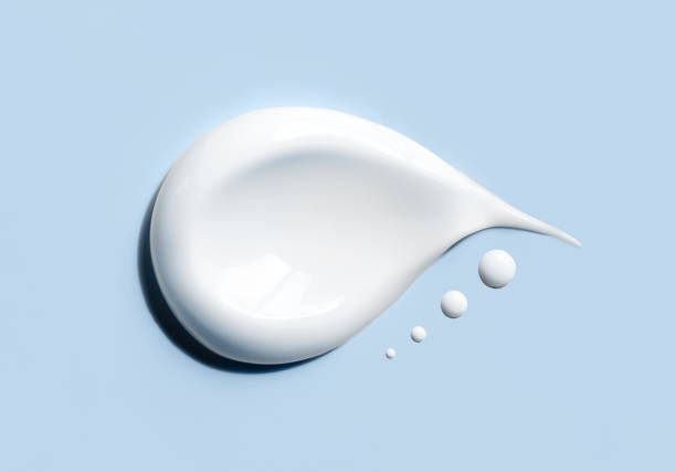 istock cosmetic smears cream texture on blue background 1492553828