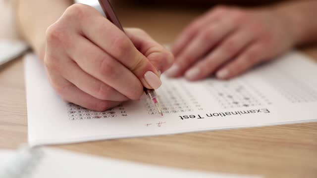 Teacher evaluates student test answers for high score