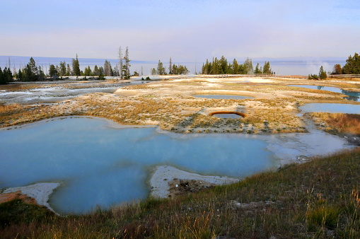 a geyser in the rocky mountains at summer