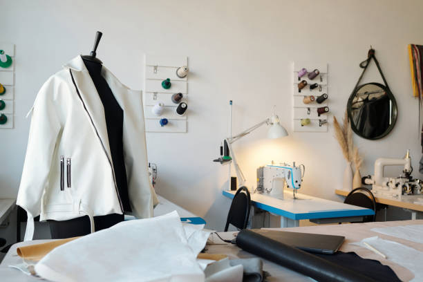 istock New white leather jacket on mannequin and workplace of tailor or leatherworker 1492560673
