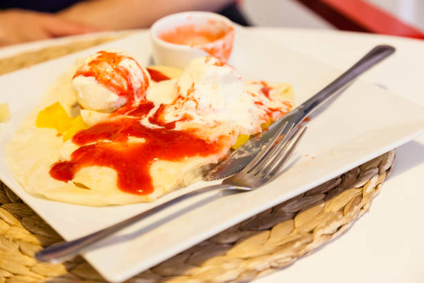 istock Pancake with ice cream and strawberry sauce 1492561621