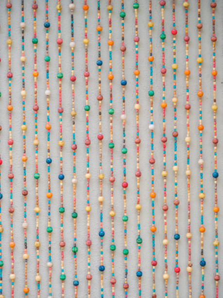 colorful beads hanging on the wall