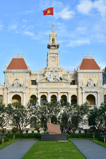 Portrait of Ho Chi Minh City People’s Committee Building with Park in Foreground stock photo