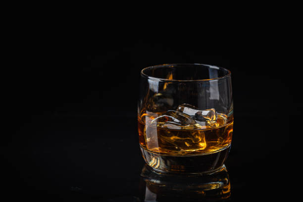 istock Whiskey with ice in glasses 1492566801