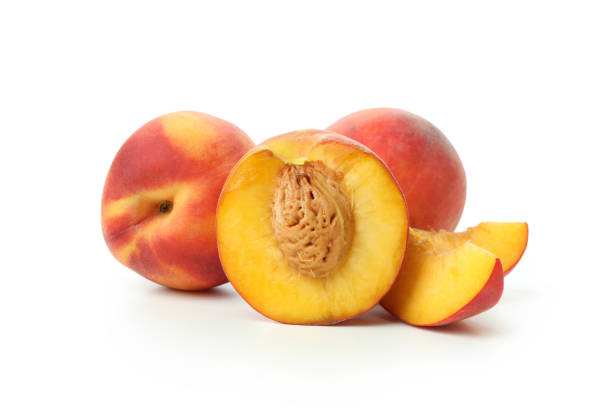 istock Ripe peach fruits isolated on white background 1492568174