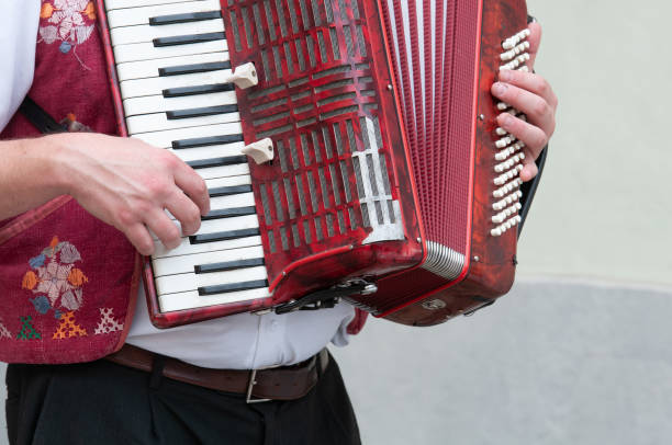 istock an accordion player  in the street 1492579190
