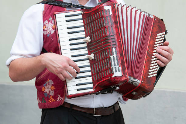 istock an accordion player  in the street 1492579497