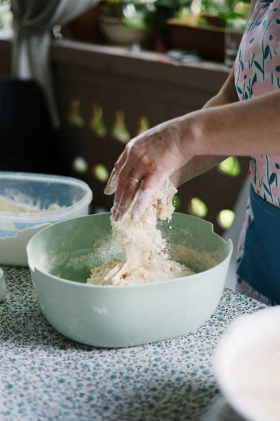 istock Woman Kneading Dough for Khachapuri 1492579974
