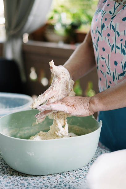 istock Woman Kneading Dough for Khachapuri 1492579975