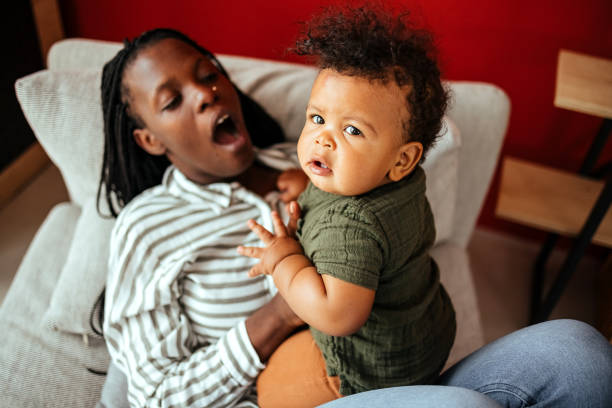 istock Mother and baby son on couch 1492582123