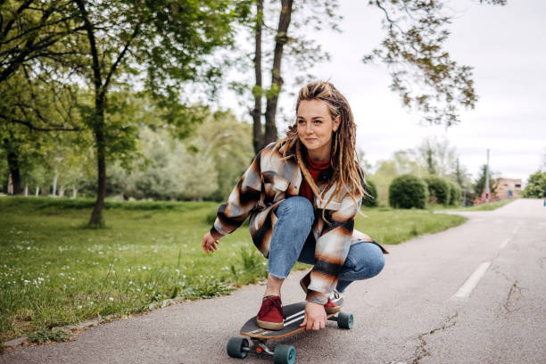 istock Young woman skating. 1492583446