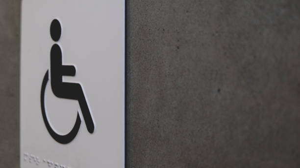 istock Disabled Wheelchair Sign Assistance Access Support Assistance Residential Office Building 1492586932
