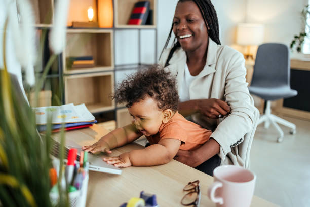istock Young mother babysitting at home 1492592195