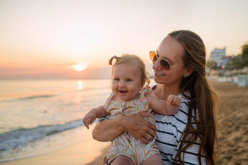 Family enjoying time together on the beach