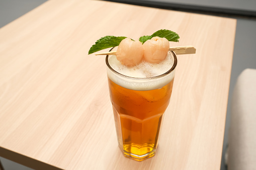 Lychee iced tea with mint leaves