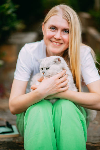 istock Young Woman and Her Beautiful Cat 1492606403