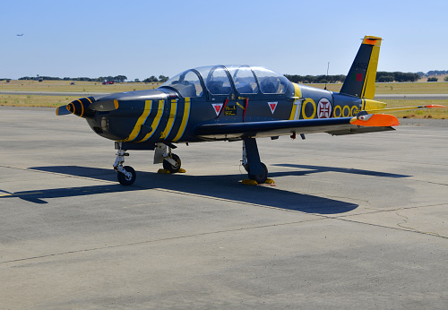 Beja, Portugal: parked Socata / Aérospatiale TB 30 Epsilon - light military trainer aircraft, a tandem two-seater with a metal airframe and a Lycoming AEIO-540-L1B5D 6-cylinder air-cooled horizontally-opposed piston engine - Beja Airport serves both civil and military aviation.