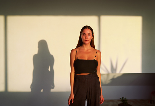 portrait standing beautiful young caucasian woman indoors yoga studio home