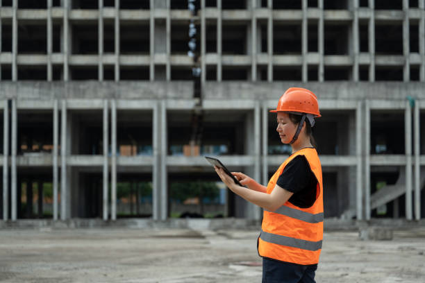 istock A female engineer works on a tablet computer at a newly built building site 1492612288