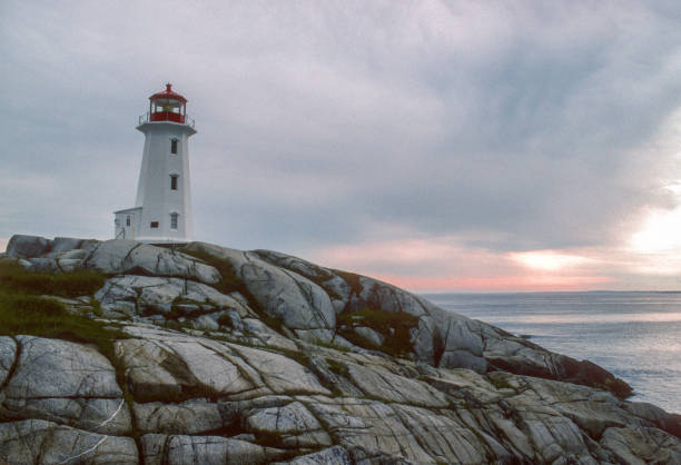 istock Peggy's Cove Lighthouse - Storm Clouds - 1994 1492613989