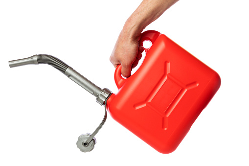 An image of two red plastic gas canisters.