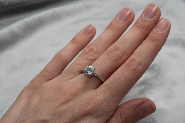 istock a ring with a large diamond on a woman's hand 1492616668