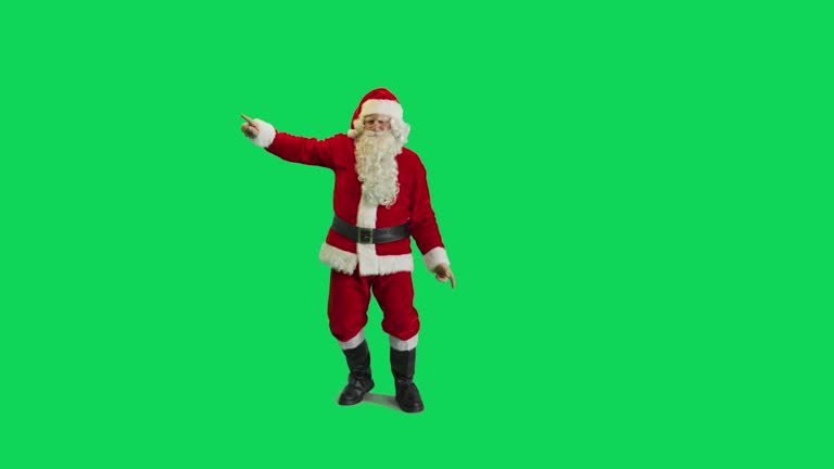 Studio Shot Isolated Mockup Template: Jolly Santa Claus Dancing On Green Screen Chromakey Background, Celebrating Christmas, New Years, Holiday Season. Happy And Joyful Celebration Of New Beginnings.