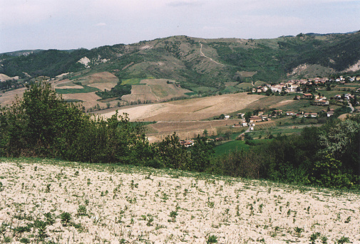 Beautiful Hill Landscape with a Small Village in Northern Italy during Spring. Fortunago, Pavia Province. Film Photography