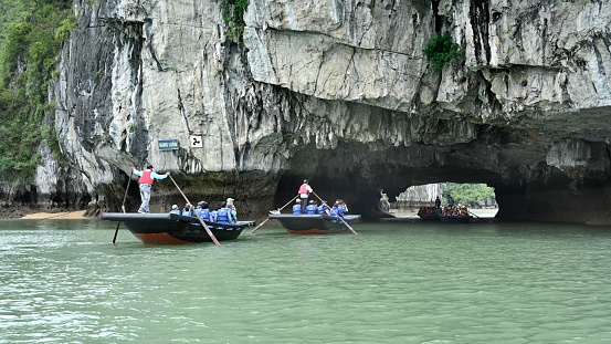 Ha Long Bay is located in Ha Long City, Quang Ning Province, Vietnam. It is a typical limestone karst landform bay. The whole bay has about 120 kilometers of coastline, a total area of about 1553 square kilometers, and about 2000 islets.\nAbout 434 square kilometers of the central area (containing 775 islets) is a World Natural Heritage Site. The scenery is beautiful and charming.\nIt is a national scenic spot in Vietnam. Countless foreign tourists come here for sightseeing.\nIn Ha Long Bay, there are many karst caves, some of them extremely large in scale, and many more small caves.