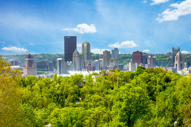 istock Pittsburgh Pennsylvania Peeking From Behind Trees 1492625376