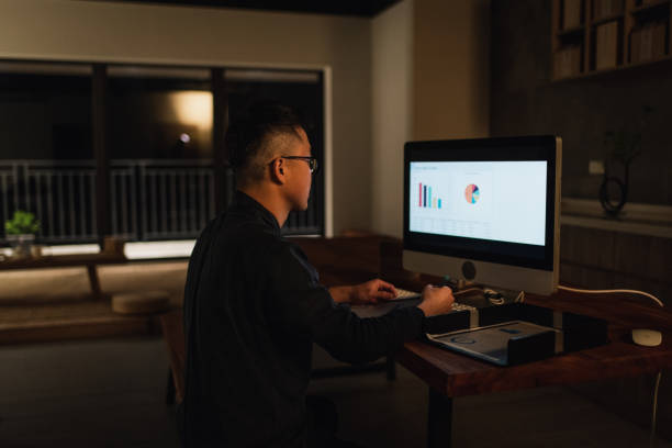 istock Tea garden owner using computer in Japanese style tea room 1492625405