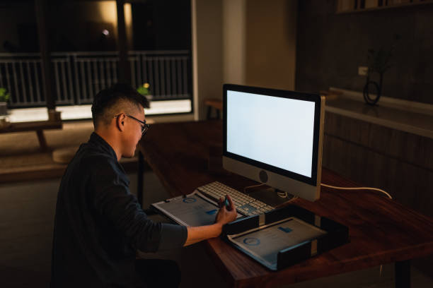 istock Tea garden owner using computer in Japanese style tea room 1492625439