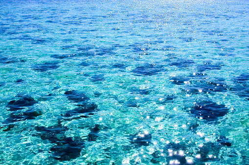 Moorea, French Polynesia - 2001: Vintage early digital photograph of the crystal clear blue ocean waters of Moorea, French Polynesia, as shot on the rare Canon EOS 1N - Kodak DCS 520, one of the first professional digital cameras.