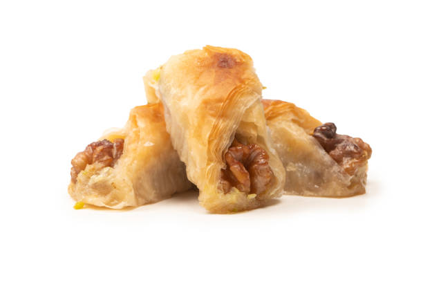 istock Delicious sweet baklava with walnuts isolated on white background. 1492626425