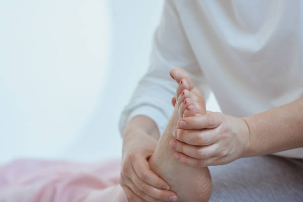 istock Hand making thai feet massage. Alternative medicine and thai massage concept 1492626470