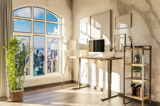 istock modern standing desk pc workplace in daylight downtown skyline office; home decoration desing and home office concept; 3D Illustration 1492628313