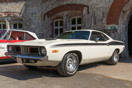 Stade, Germany – May 13, 2023: A Plymouth 'Cuda from 1973 at  Spring Fling, an annual meeting of Vintage Chrysler Motor Company car owners.