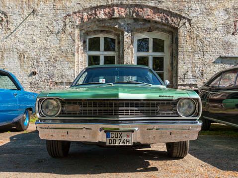 Stade, Germany – May 13, 2023: A Dodge Dart muscle car from 1974 at  Spring Fling, an annual meeting of Vintage Chrysler Motor Company car owners.