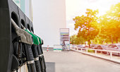 Close up of diesel and petrol fuel pistols at a gas station. The fuel crisis continues and the cost of fuel is going up