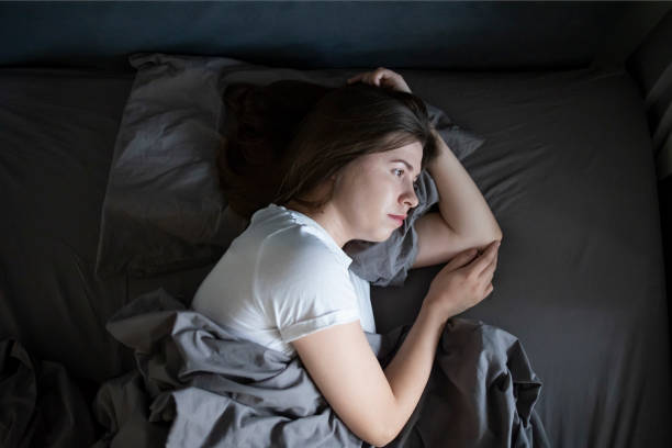 istock Sad and upset woman deep in thought 1492637119