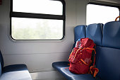 backpack sitting in the train. Traveling, journey.