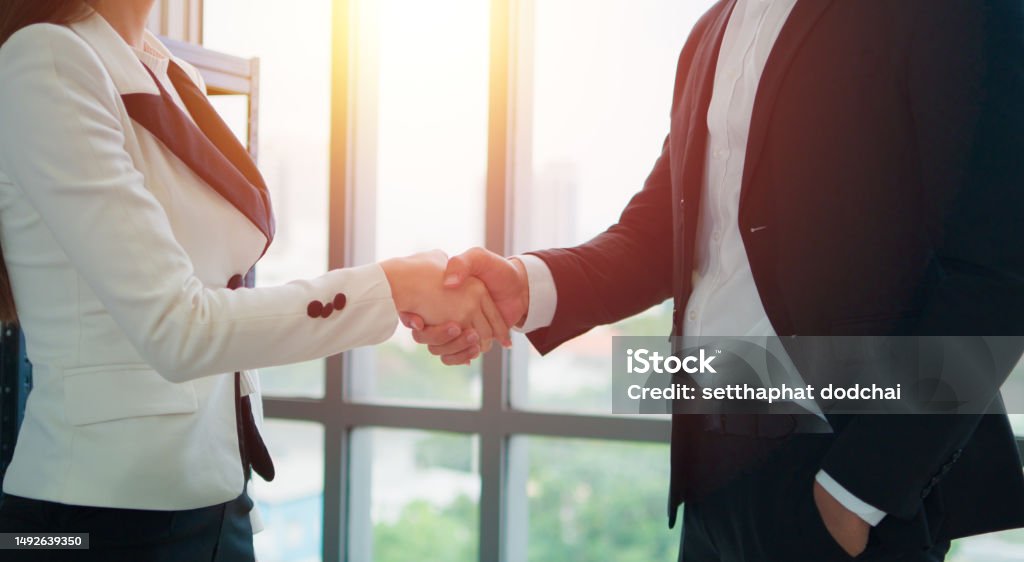 Closeup Hand Asian Male Hands Handshake Business Partners Negotiate Closeup Hand Asian Male Hands Handshake Business Partners Negotiate
