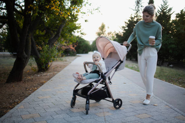 Woman with her baby in stroller