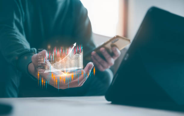 istock investment stock market data analysis concept, businessman using smartphone analyst  virtual trading graph, trading online, financial mobile application platform 1492643074