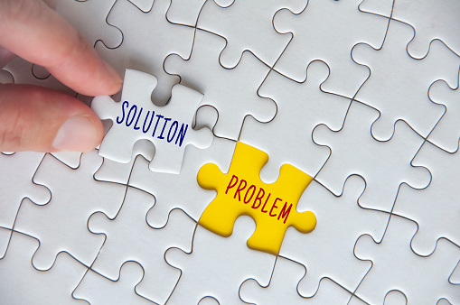 Solution to a problem text on missing jigsaw puzzle. Problem solving concept.